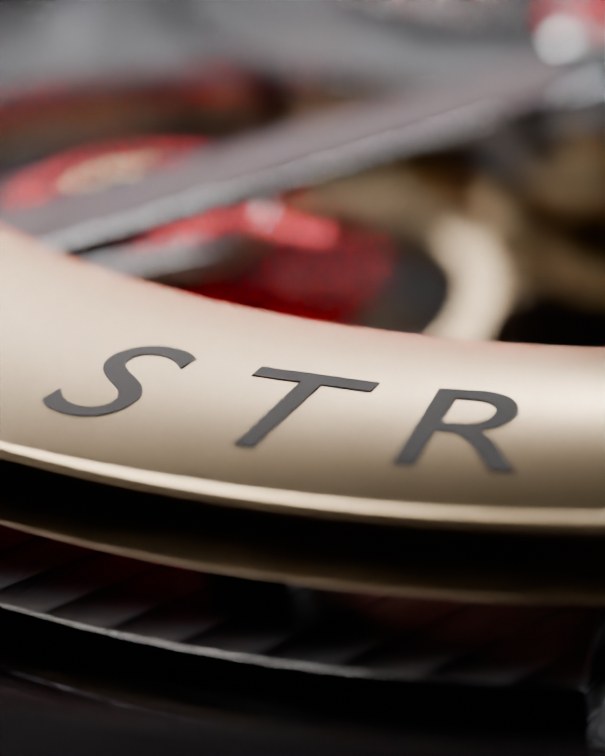 Engraved rotor marked STRIVE